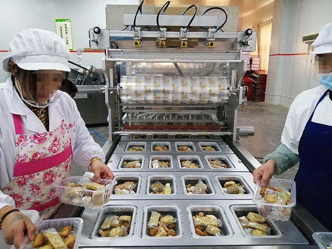 Blog perusahaan terbaru tentang Sealer Tray Otomatis untuk Produksi Pastry Sealing Line